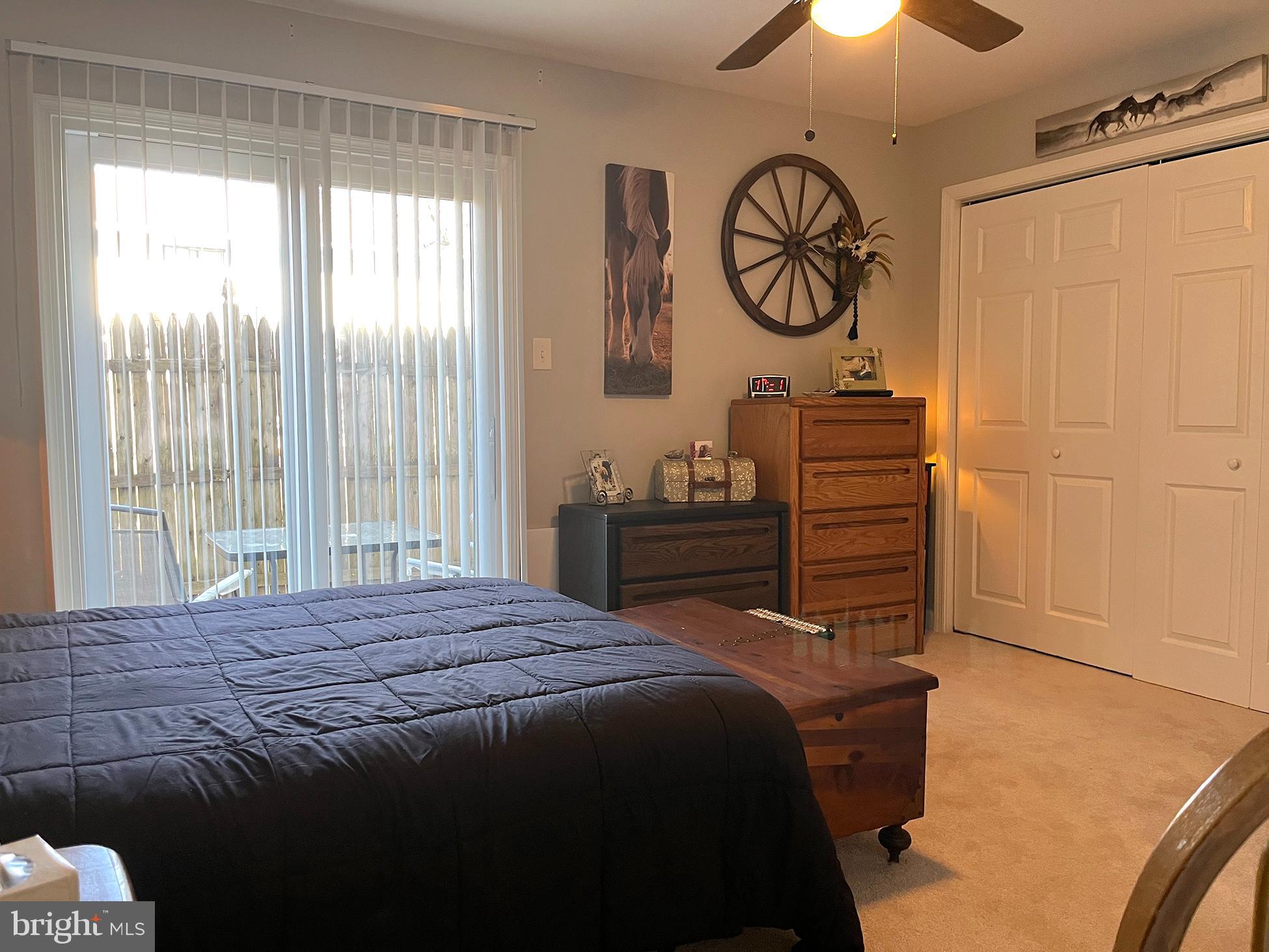 40 Tansboro Road, Unit 3A Berlin, NJ 08009 - Photo 10 of 19 a bedroom with a bed and a chandelier