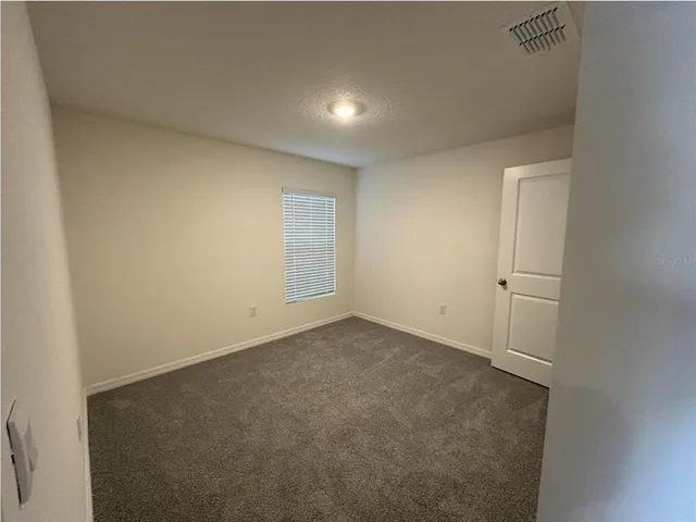 an empty room with an empty room