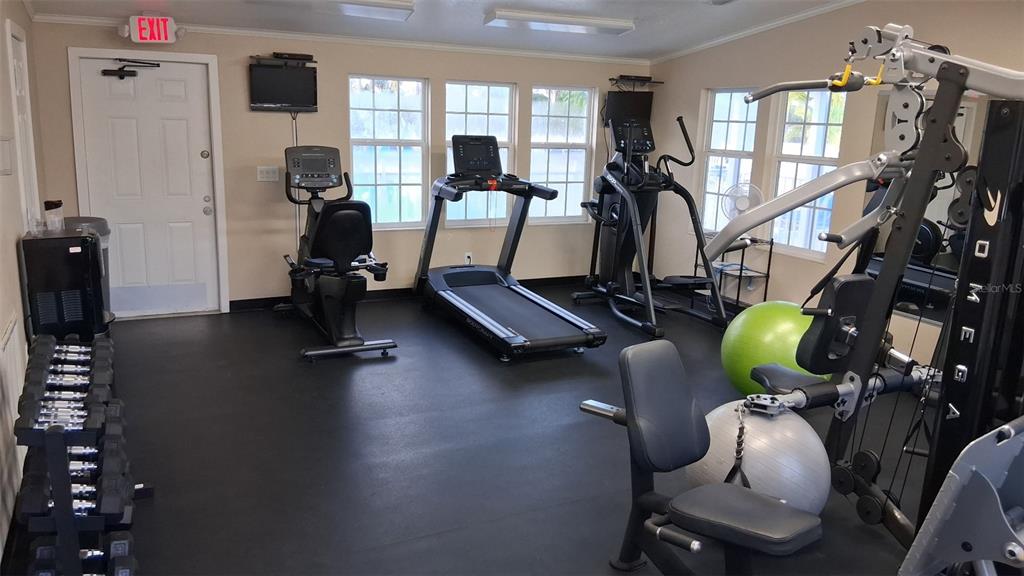 1300 State Rte 777, Unit W 86 Venice, FL 34293 - Photo 14 of 15 a room with gym equipment