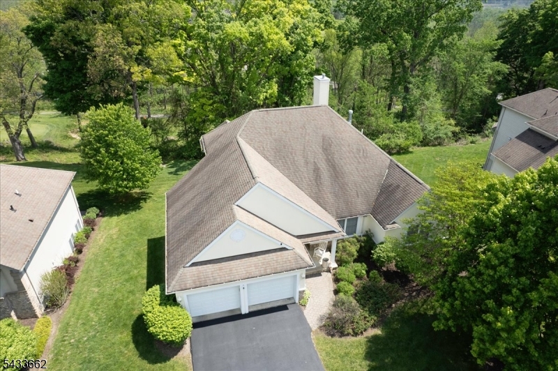 15 Bracken Hill Road Hamburg, NJ 07419 - Photo 40 of 44 a aerial view of a house with a yard and potted plants