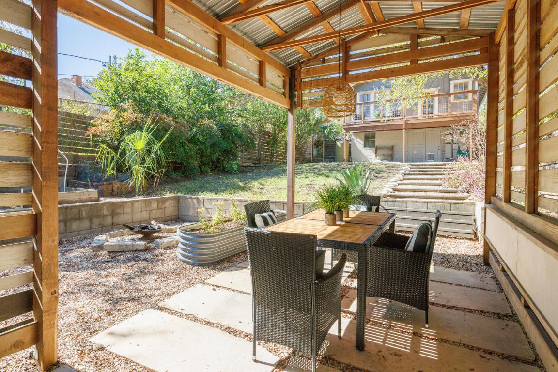 711 Patterson Avenue Austin, TX 78703 - Photo 18 of 21 a view of a patio with a dining table and chairs
