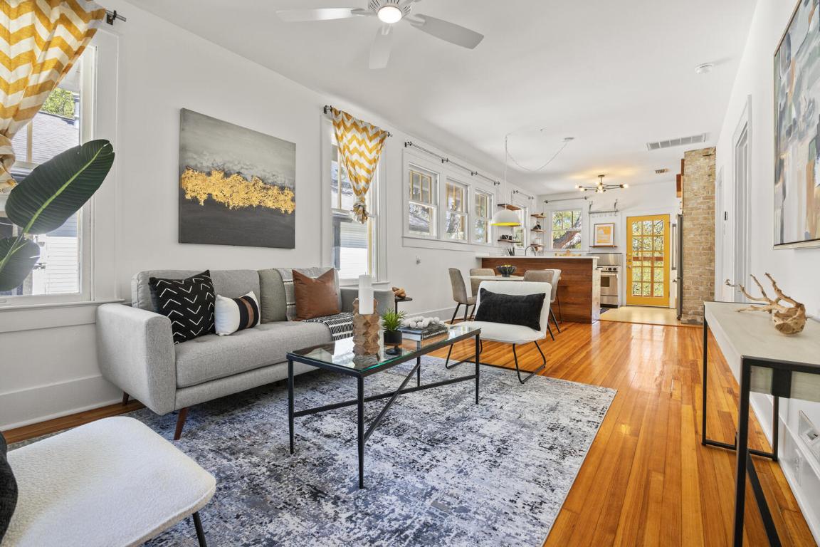 711 Patterson Avenue Austin, TX 78703 - Photo 2 of 21 a living room with furniture and a wooden floor