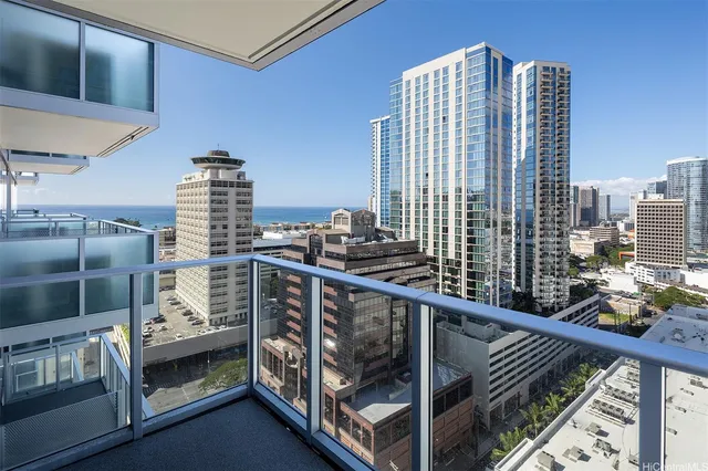a view of balcony with wooden floor