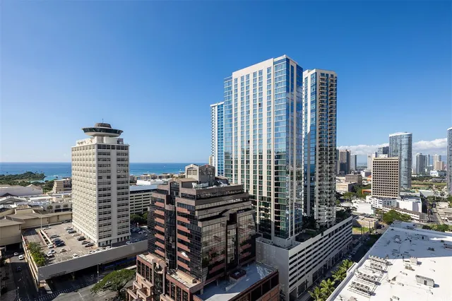 a view of city with tall buildings