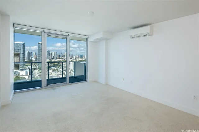 a view of an empty room with a fireplace
