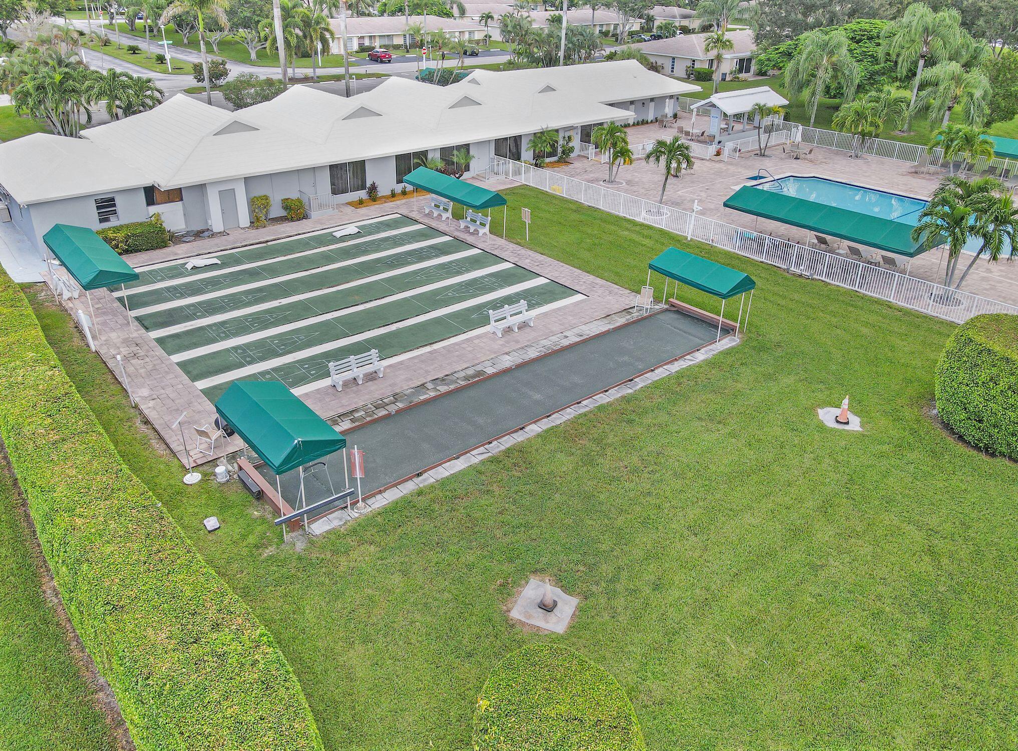 8807 Bella Vista Drive, Unit 280 Boca Raton, FL 33433 - Photo 33 of 44 a view of a house with a yard