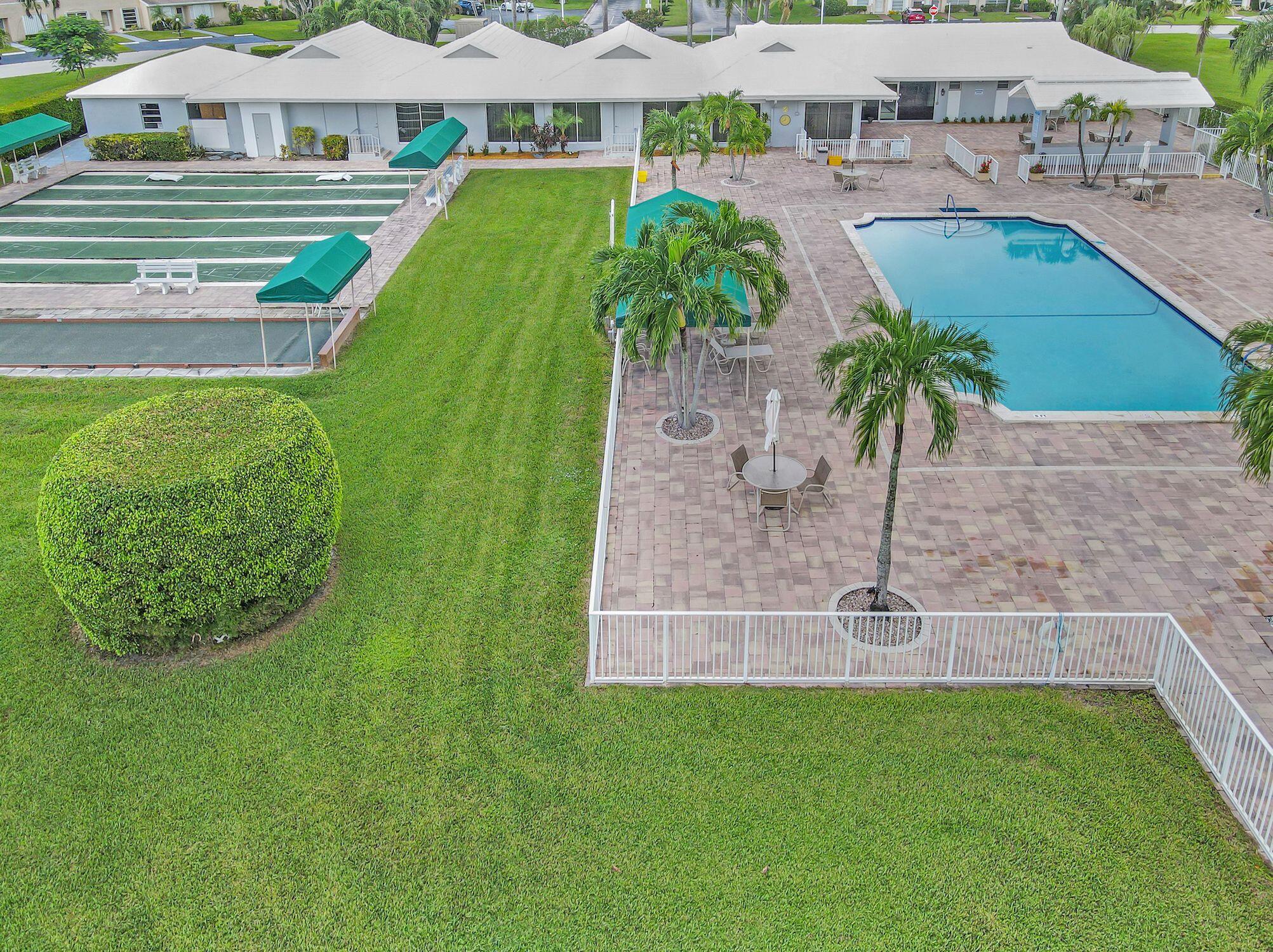 8807 Bella Vista Drive, Unit 280 Boca Raton, FL 33433 - Photo 35 of 44 an aerial view of a house