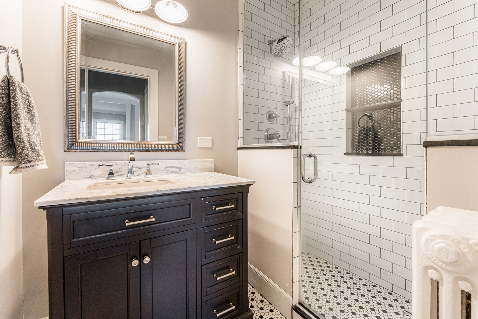 18715 West Edwards Road Antioch, IL 60002 - Photo 23 of 66 a bathroom with a sink a vanity and a mirror