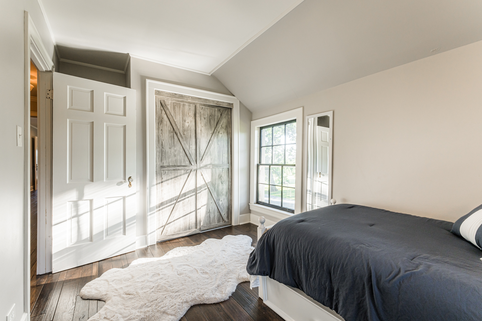 18715 West Edwards Road Antioch, IL 60002 - Photo 39 of 66 a bedroom with a bed and a large window with outer view