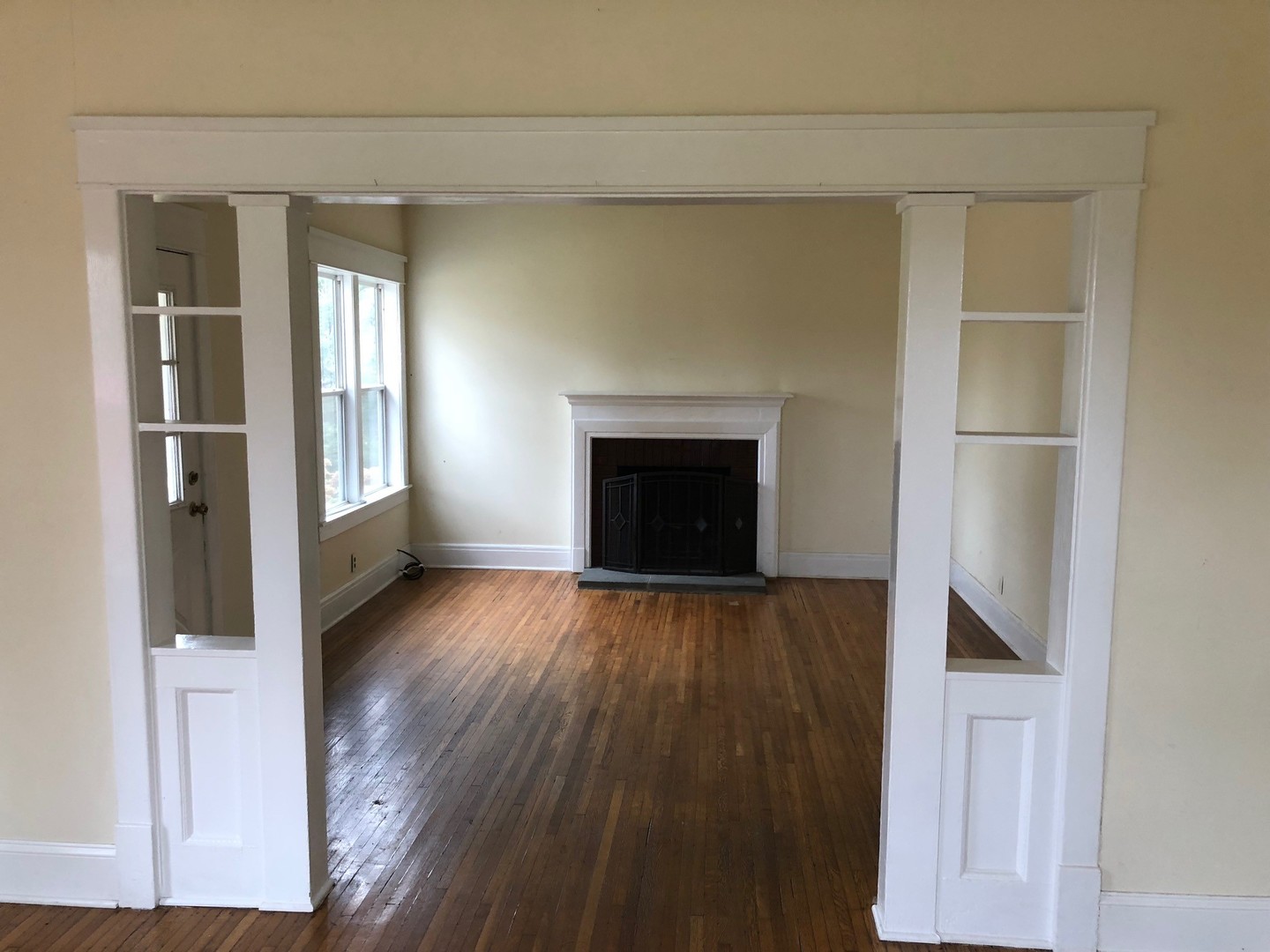 18715 West Edwards Road Antioch, IL 60002 - Photo 60 of 66 a view of an empty room with wooden floor and a window