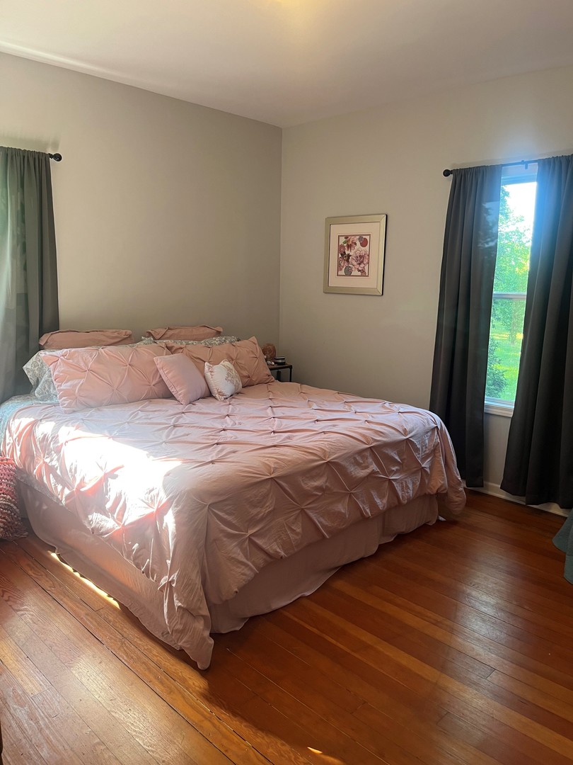 18715 West Edwards Road Antioch, IL 60002 - Photo 62 of 66 a bedroom with a bed and a mirror