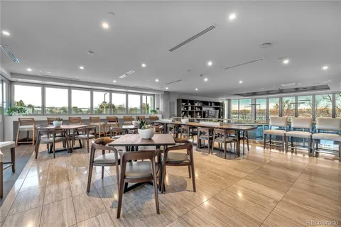 a view of a dining area with furniture and rug