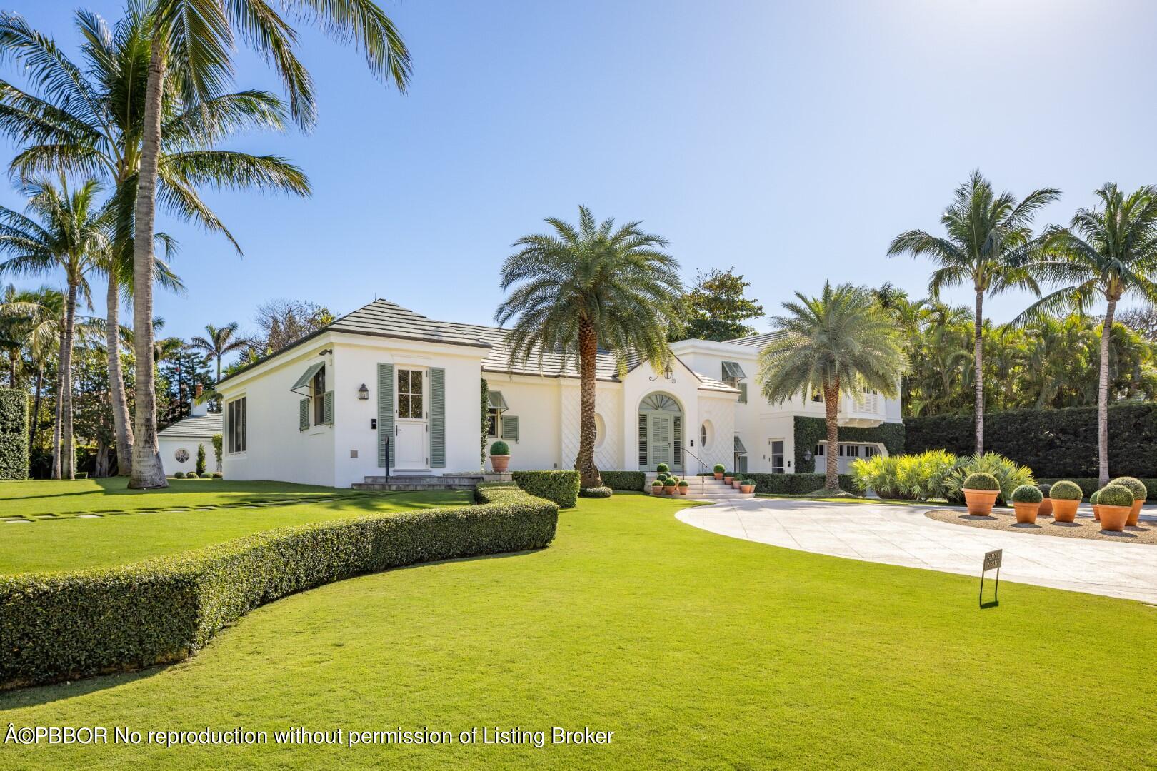 710 South County Road Palm Beach, FL 33480 - Photo 16 of 69 a front view of house with yard and swimming pool