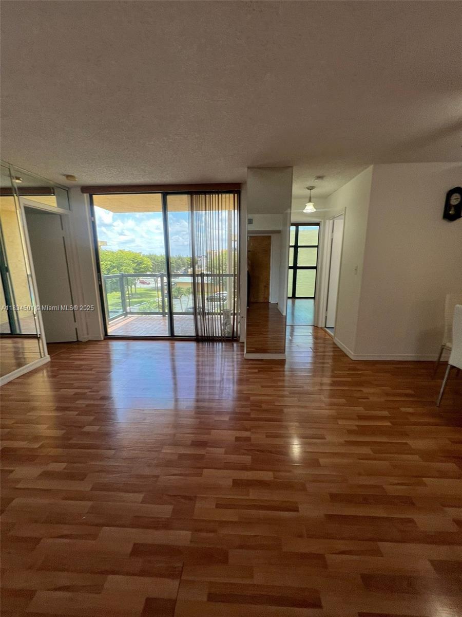 International Park Miami, FL 33175 - Photo 17 of 26 a view of an empty room with wooden floor and a window