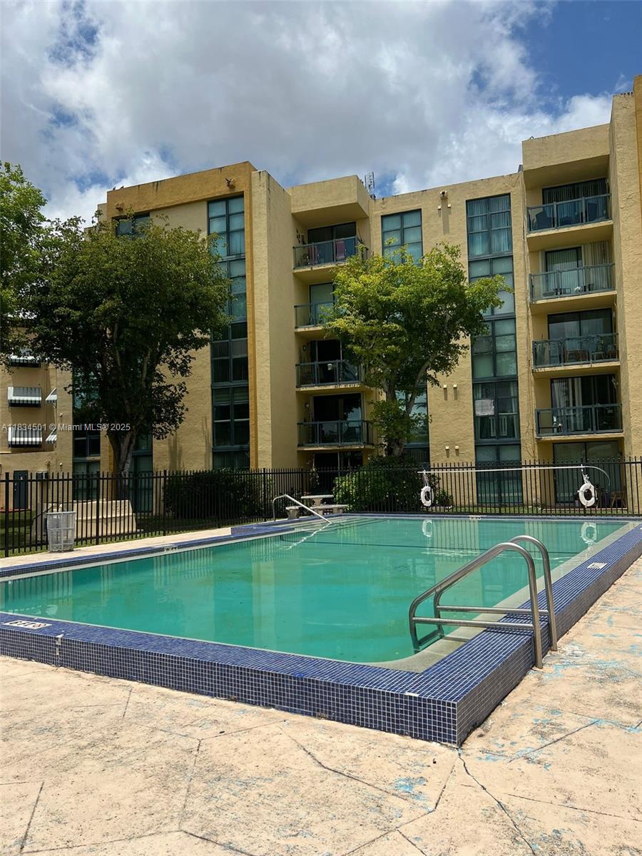 International Park Miami, FL 33175 - Photo 20 of 26 a front view of a house with a yard
