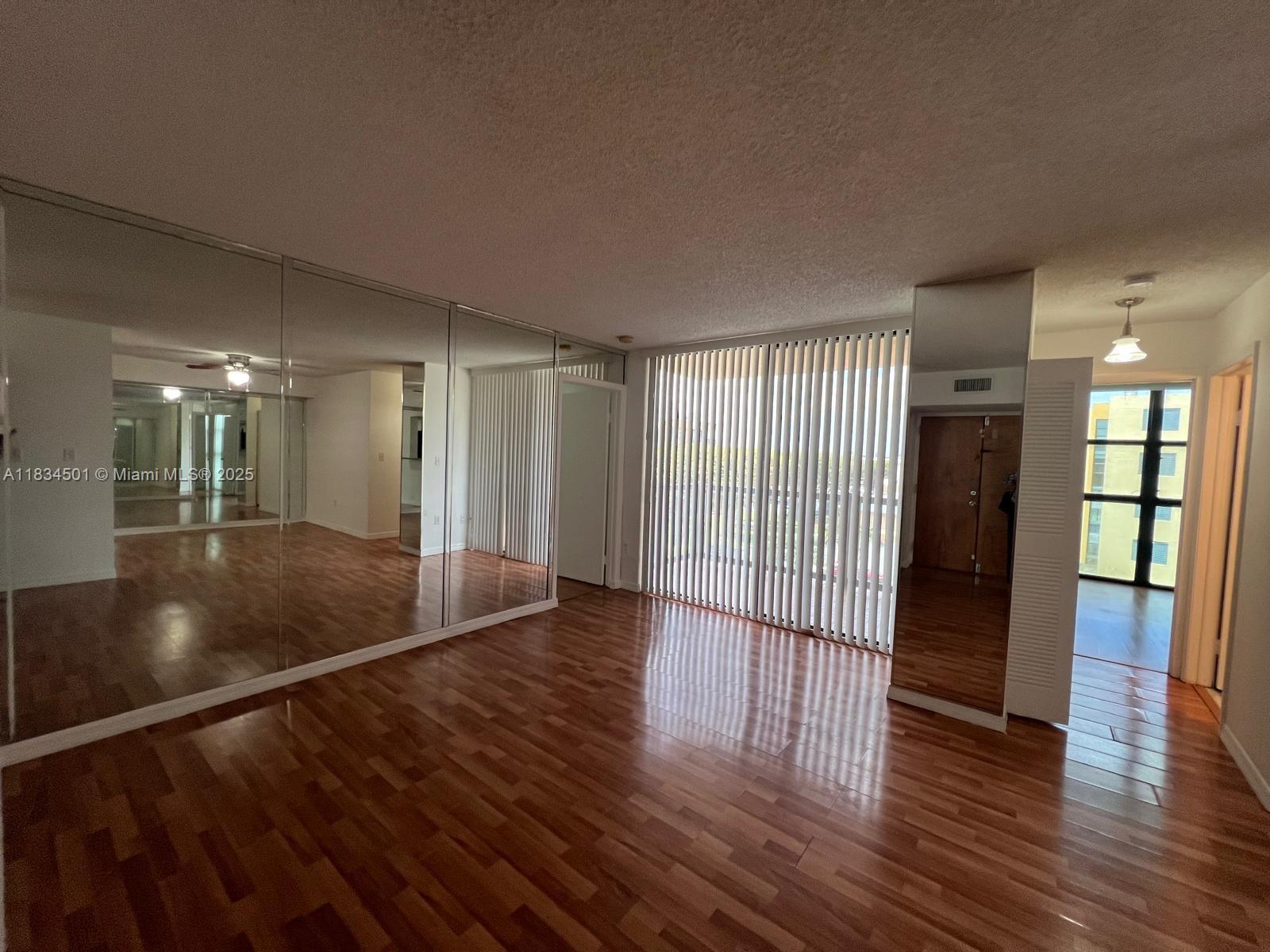 International Park Miami, FL 33175 - Photo 3 of 26 a view of gallery with wooden floor