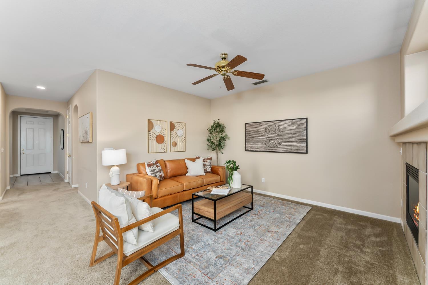 5013 Millner Way Elk Grove, CA 95757 - Photo 9 of 38 Flames in fireplace have been digitally enhanced.