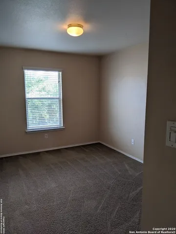 a view of a yard in front of house