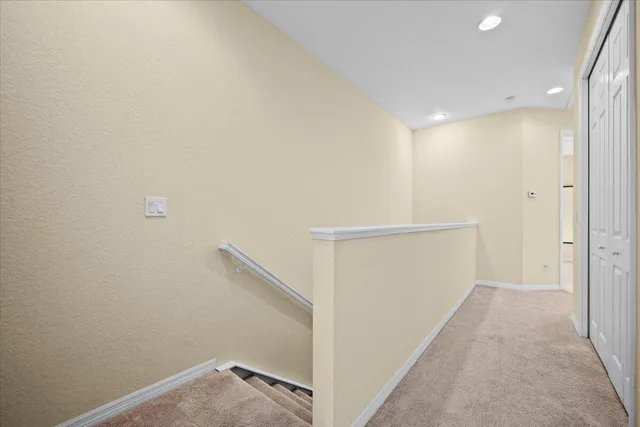 a view of hallway with stairs