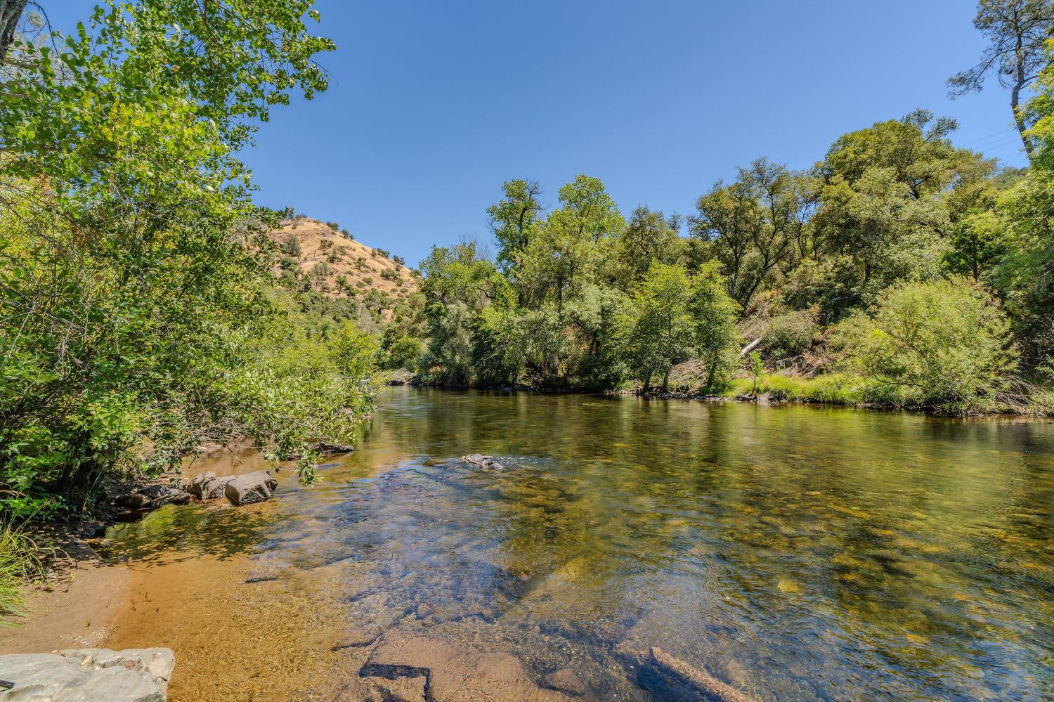 0 Electra Road Jackson, CA 95642 - Photo 12 of 51 a view of a lake with houses