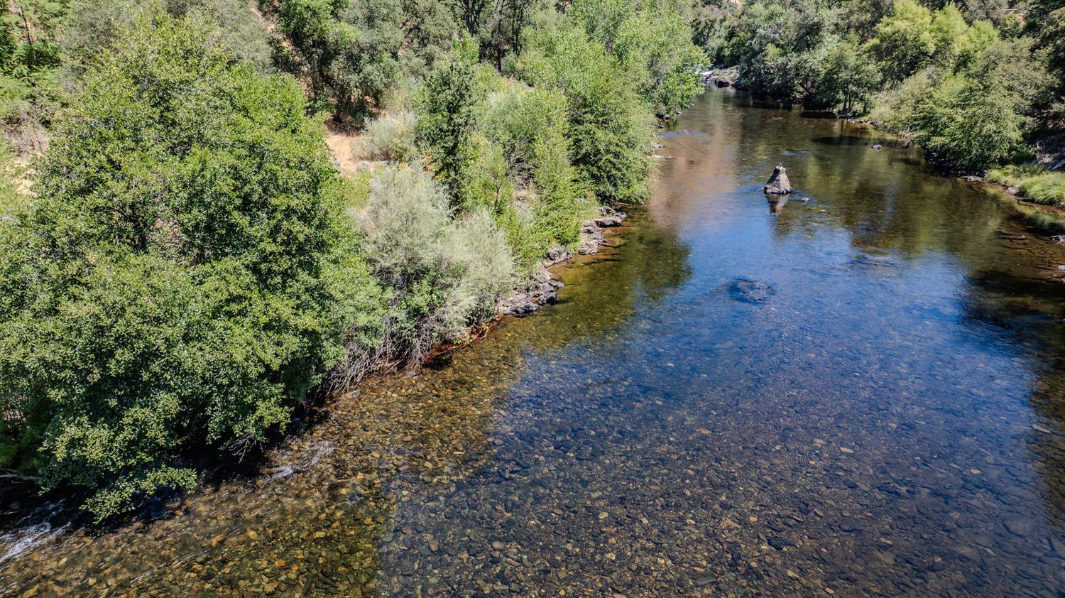0 Electra Road Jackson, CA 95642 - Photo 21 of 51 a view of a lake with houses