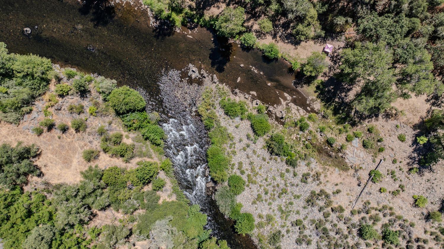 0 Electra Road Jackson, CA 95642 - Photo 26 of 51 a view of a lake with a building