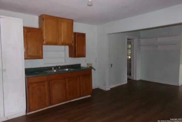 a bathroom with a sink and toilet