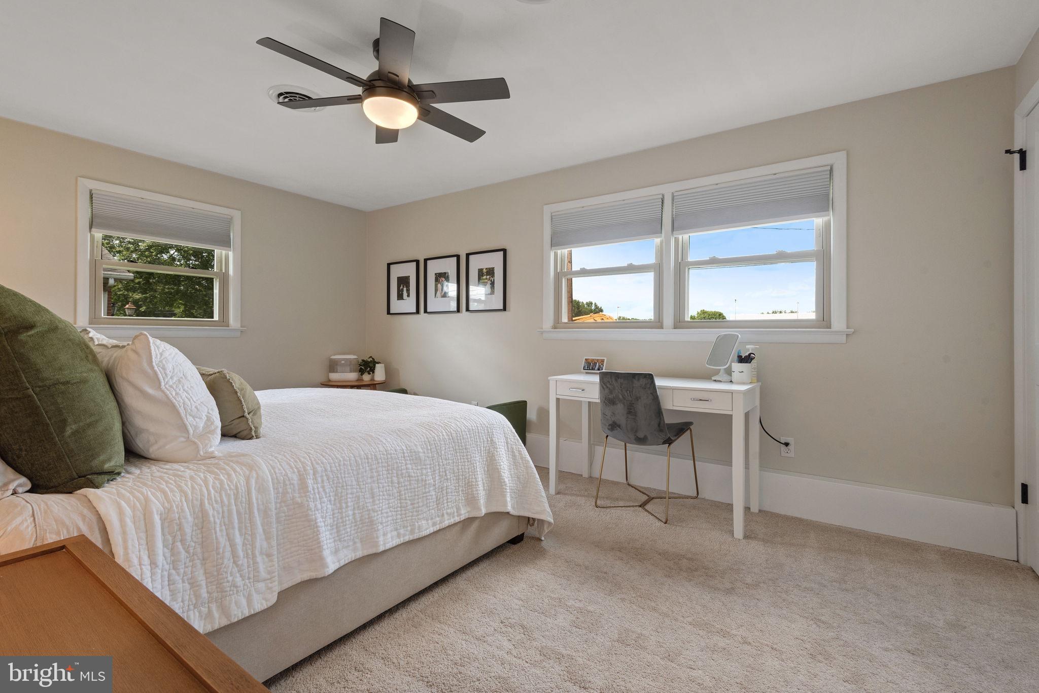 170 Hershey Drive Manheim, PA 17545 - Photo 18 of 33 a bedroom with a bed and a table in it with window