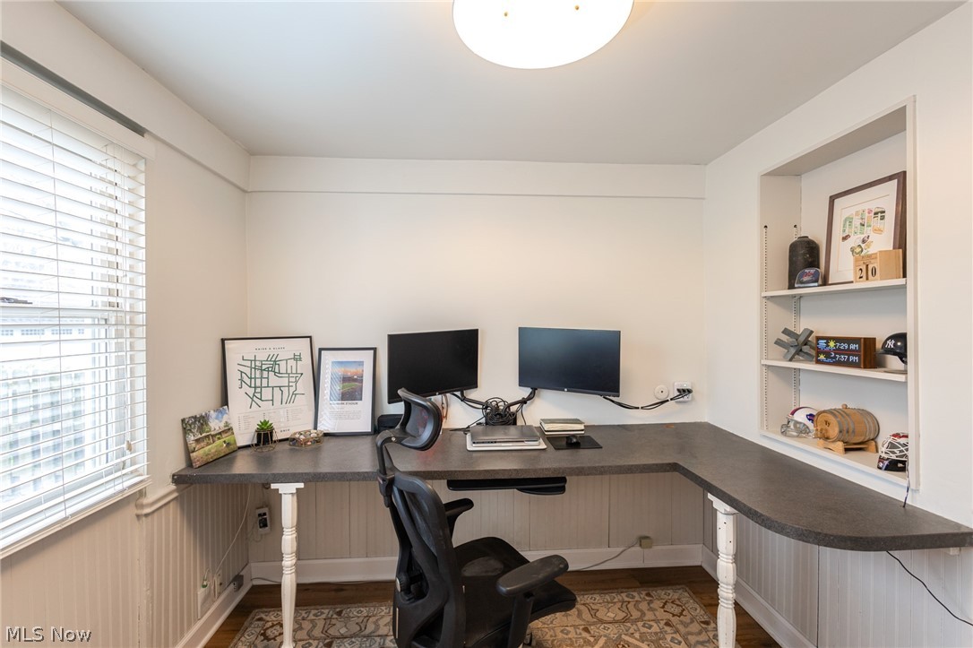 3369 Avalon Road Cleveland, OH 44120 - Photo 13 of 38 Home office featuring wood finished floors, healthy amount of natural light, and built in desk