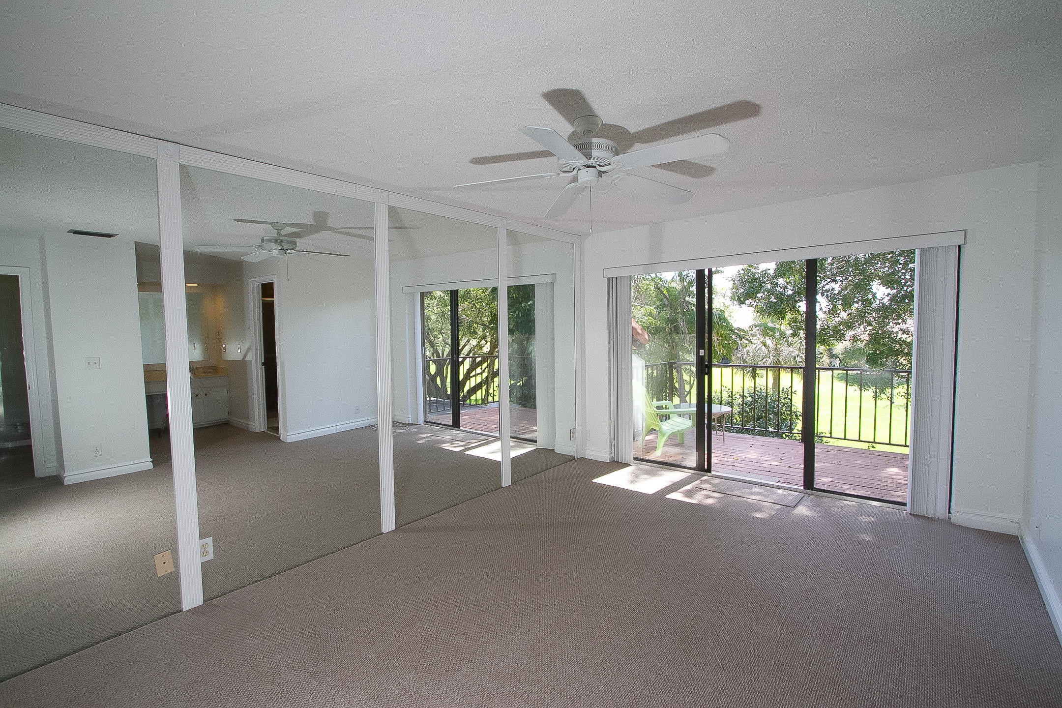 454 Ashwood Place Boca Raton, FL 33431 - Photo 12 of 30 a view of an empty room with a window