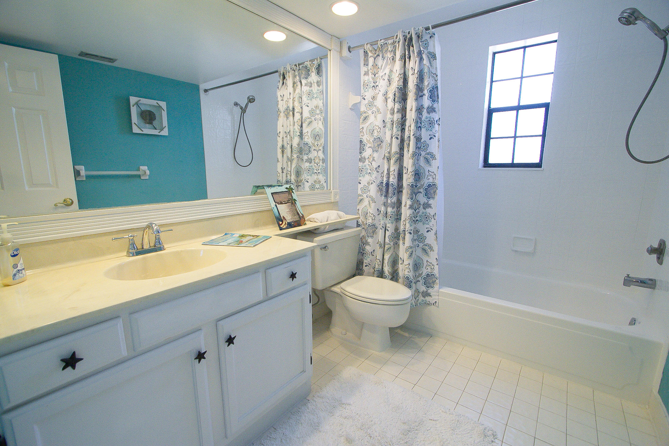 454 Ashwood Place Boca Raton, FL 33431 - Photo 22 of 30 a bathroom with a granite countertop sink a toilet and shower