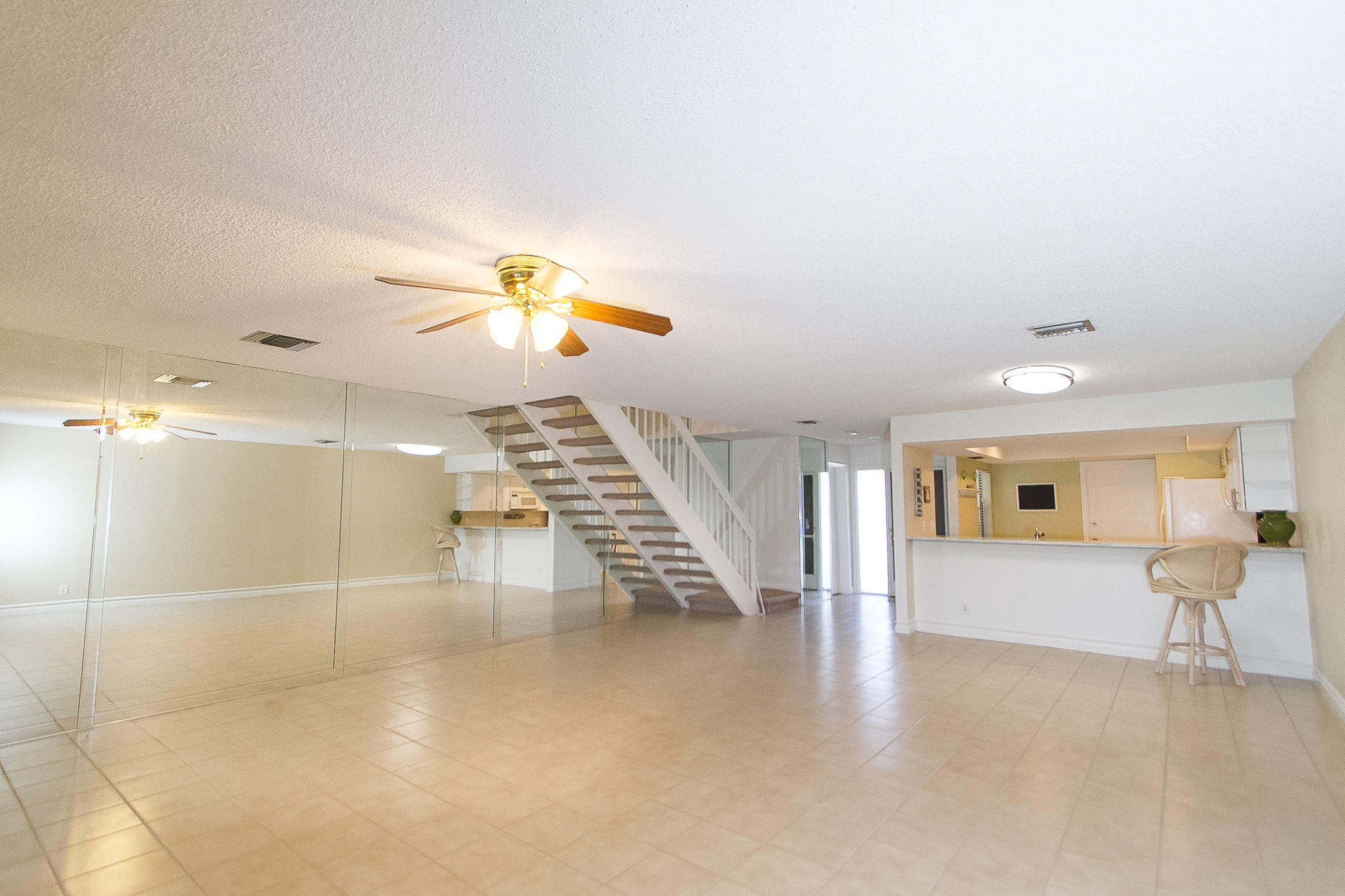 454 Ashwood Place Boca Raton, FL 33431 - Photo 3 of 30 a view of an entryway with wooden floor