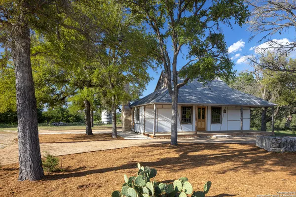 a house with trees in front of it