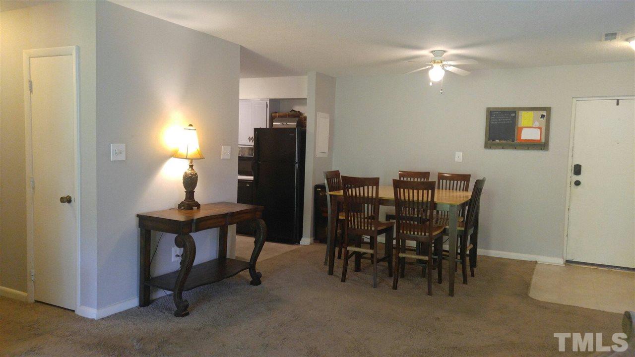 5114 Flint Ridge Place, Unit 5114 Raleigh, NC 27609 - Photo 2 of 9 a view of a workspace with furniture