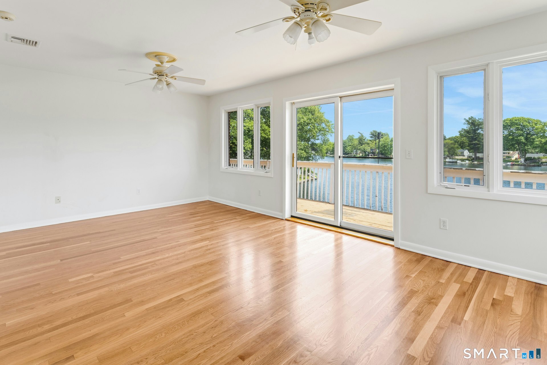 192 Frenchtown Road Bridgeport, CT 06606 - Photo 10 of 28 Ceiling fans, walk out to full sized deck, views, and loads of sunshine