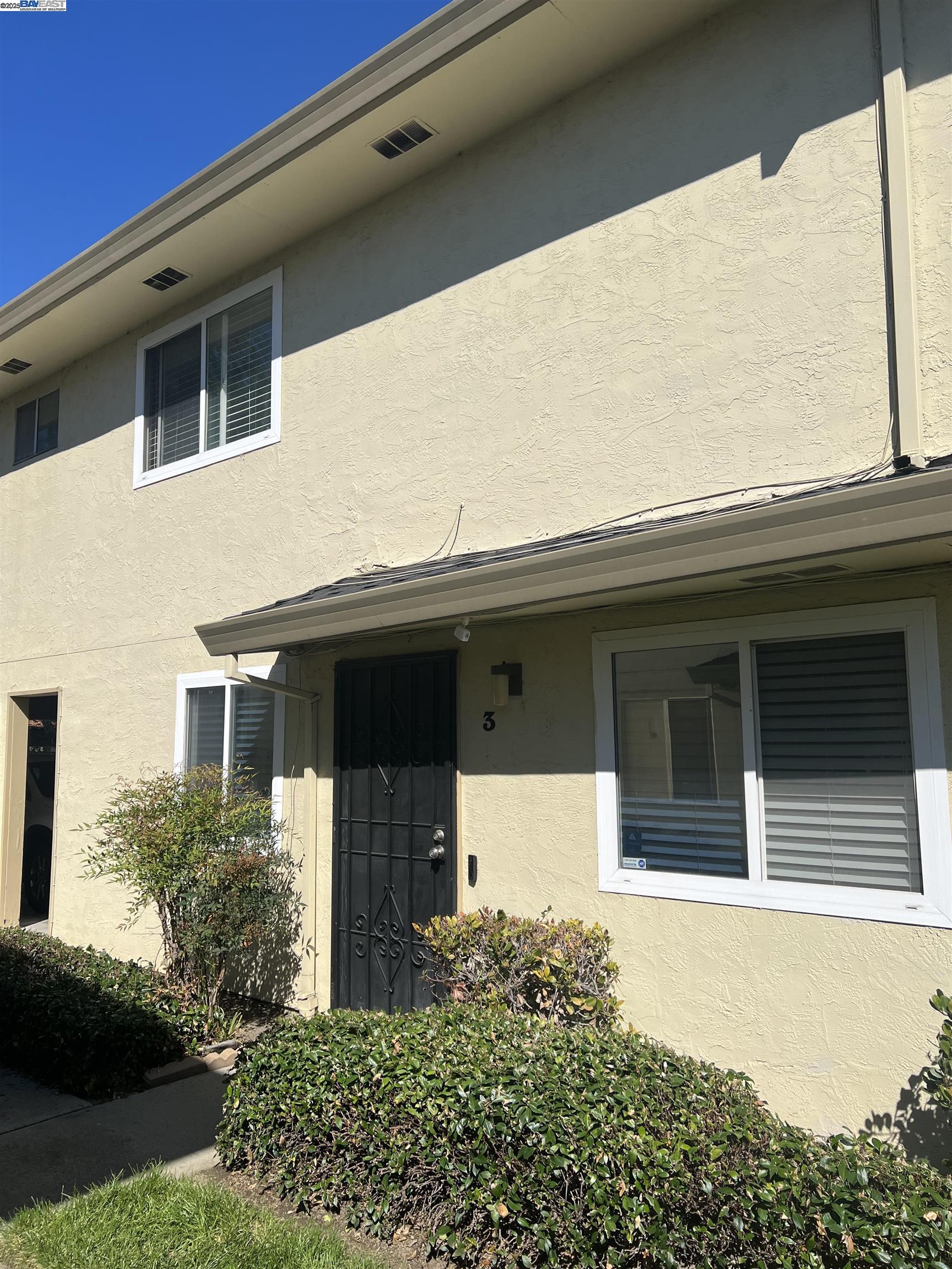 a front view of a house with a garage