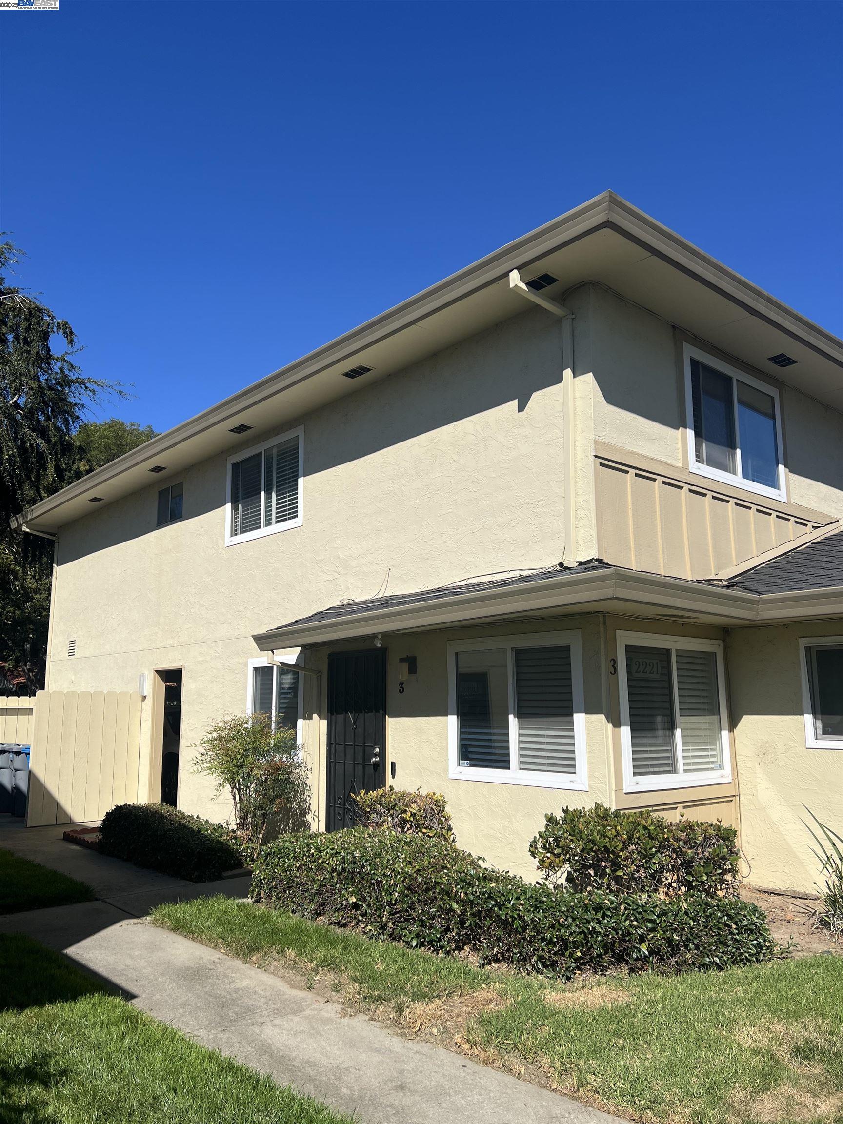 2221 Partridge Way, Unit 3 Union City, CA 94587 - Photo 2 of 11 a front view of a house with a yard