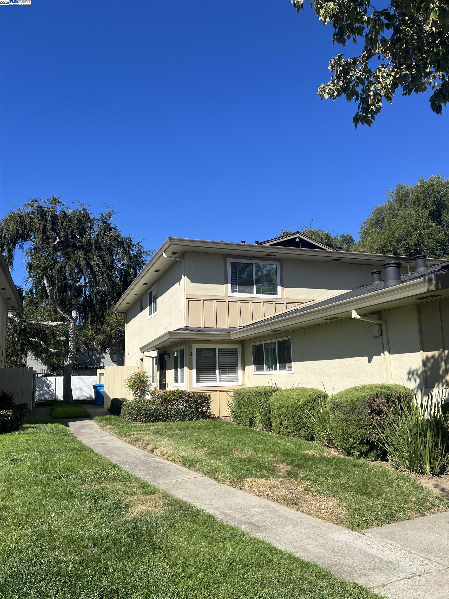 2221 Partridge Way, Unit 3 Union City, CA 94587 - Photo 3 of 11 a front view of a house with a yard