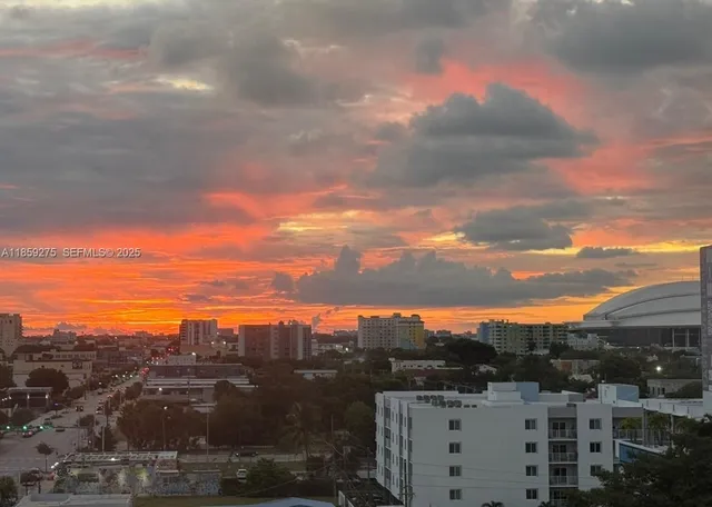 a view of city and a tall buildings