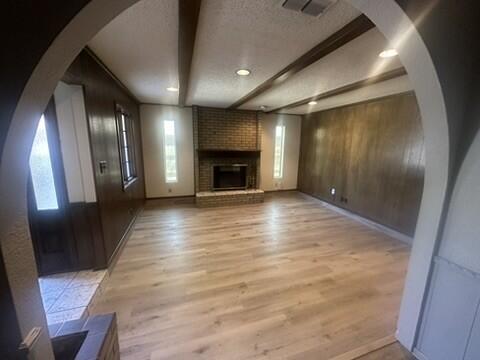 3209 66th Street, Unit A Lubbock, TX 79413 - Photo 3 of 10 a view of a hallway with wooden floor