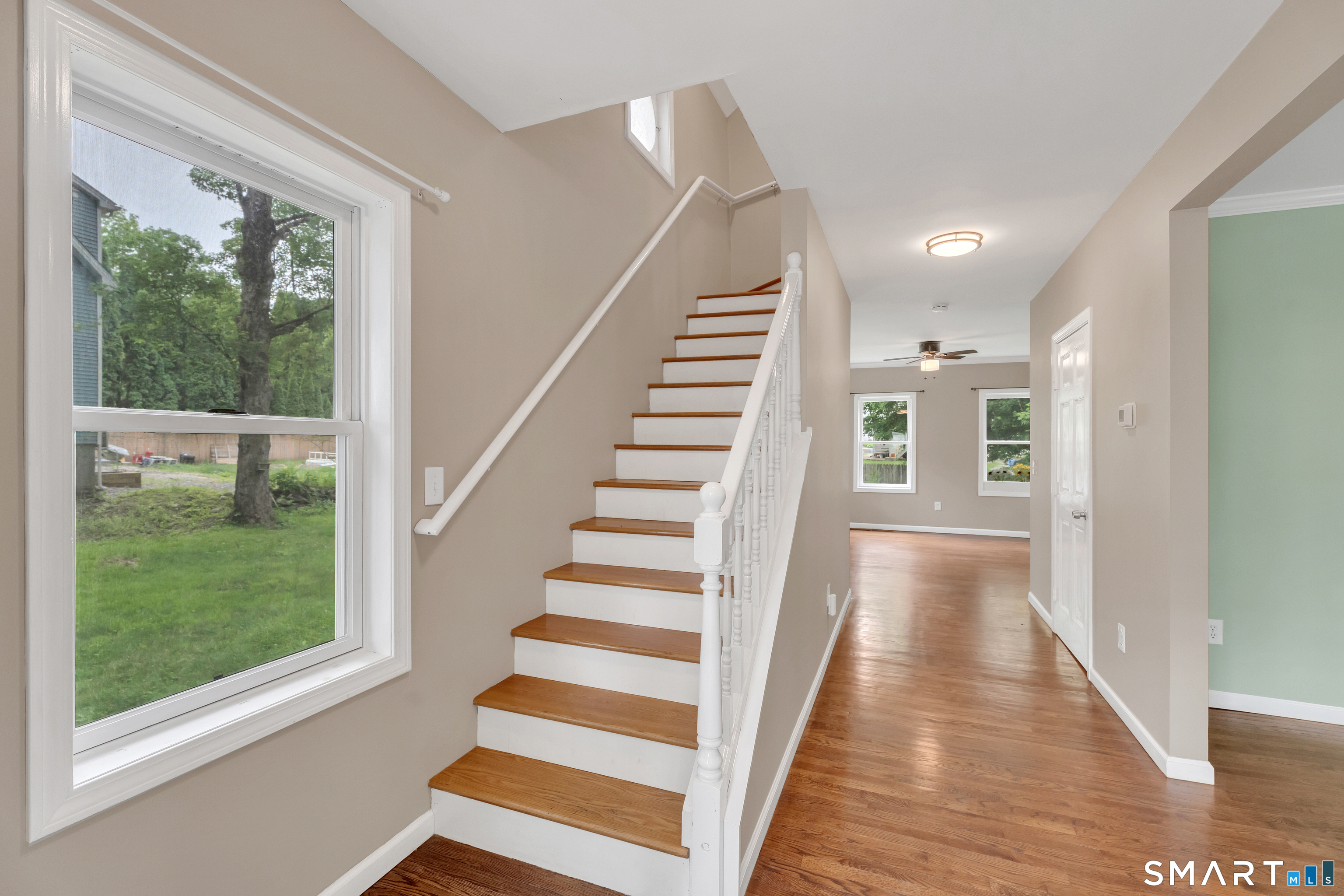 75 Summit Street Norwich, CT 06360 - Photo 13 of 40 a view of a hallway with wooden floor and entryway