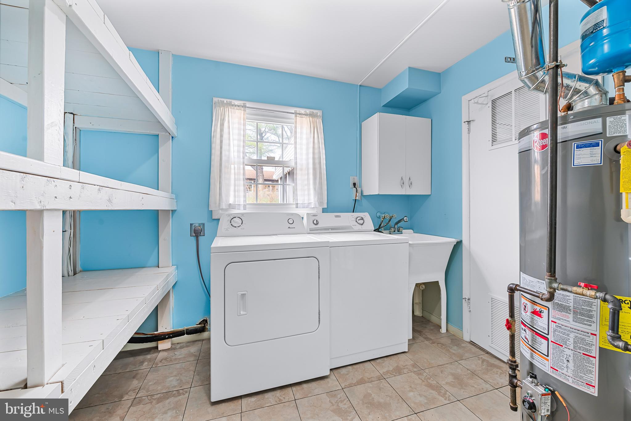7958 Citadel Drive Severn, MD 21144 - Photo 18 of 32 a utility room with dryer and washer