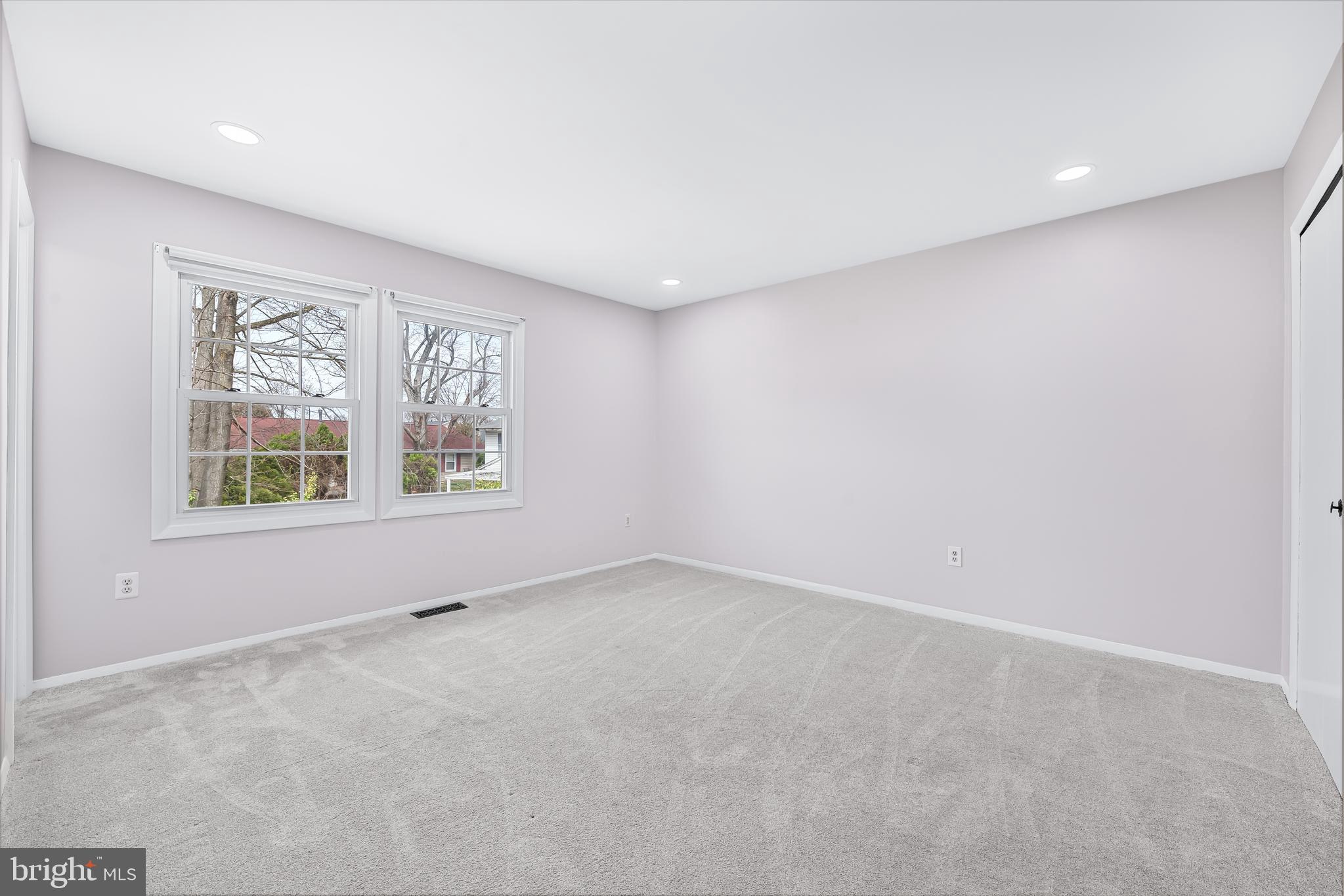 7958 Citadel Drive Severn, MD 21144 - Photo 26 of 32 an empty room with windows