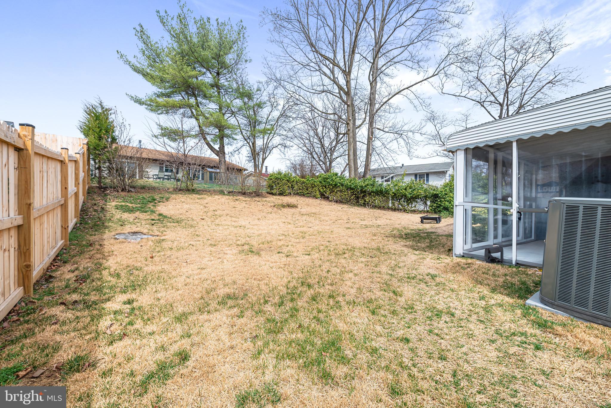 7958 Citadel Drive Severn, MD 21144 - Photo 31 of 32 a view of a yard with wooden fence