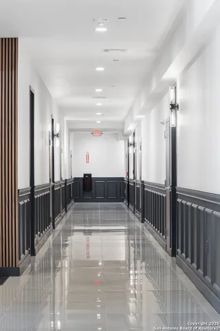 a view of a lobby with black and white walls