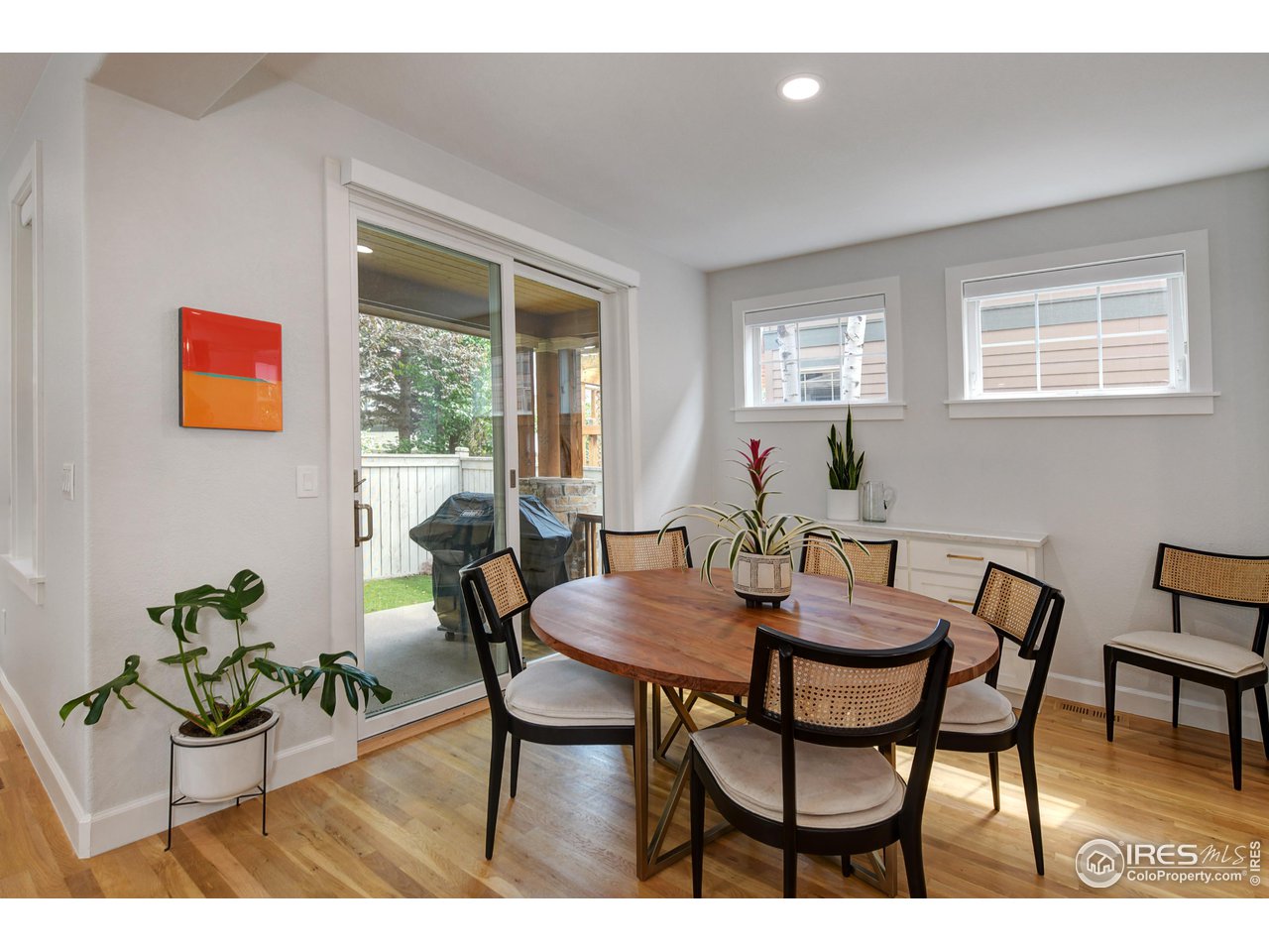 755 Terrace Circle South Boulder, CO 80304 - Photo 11 of 38 a view of a dining room with furniture and wooden floor