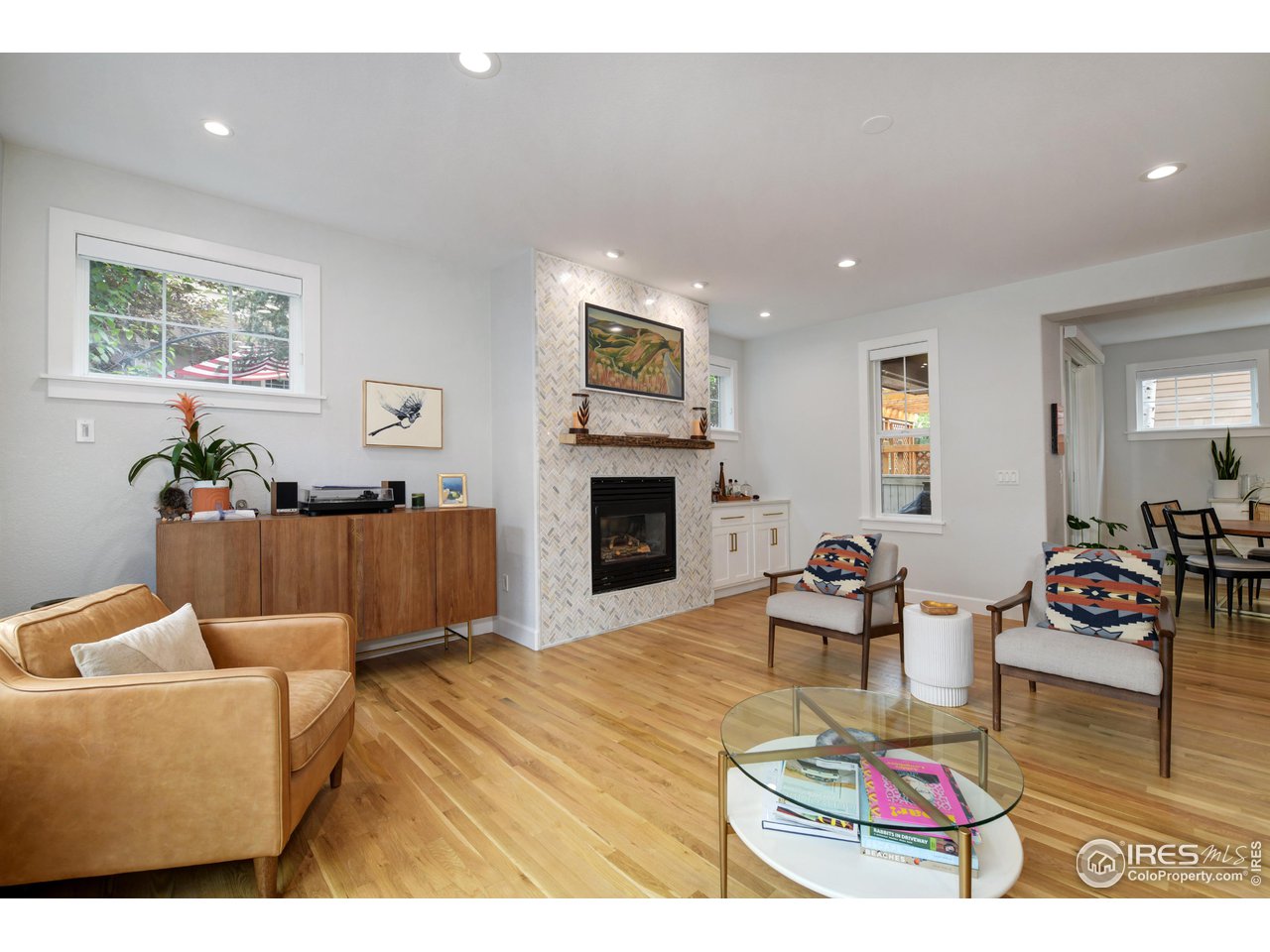 755 Terrace Circle South Boulder, CO 80304 - Photo 13 of 38 a living room with furniture and a fireplace
