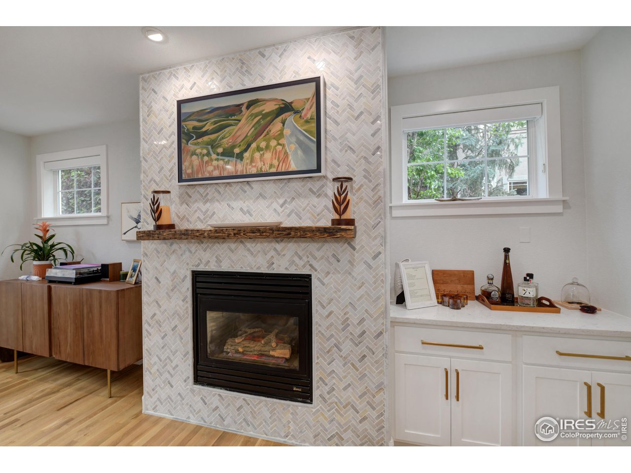 755 Terrace Circle South Boulder, CO 80304 - Photo 15 of 38 a living room with furniture and a fireplace