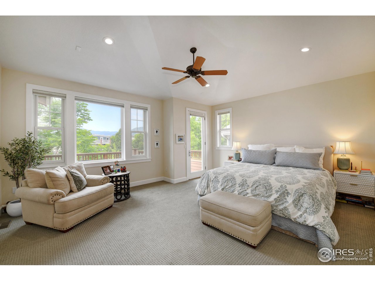 755 Terrace Circle South Boulder, CO 80304 - Photo 20 of 38 a living room with furniture and a large window