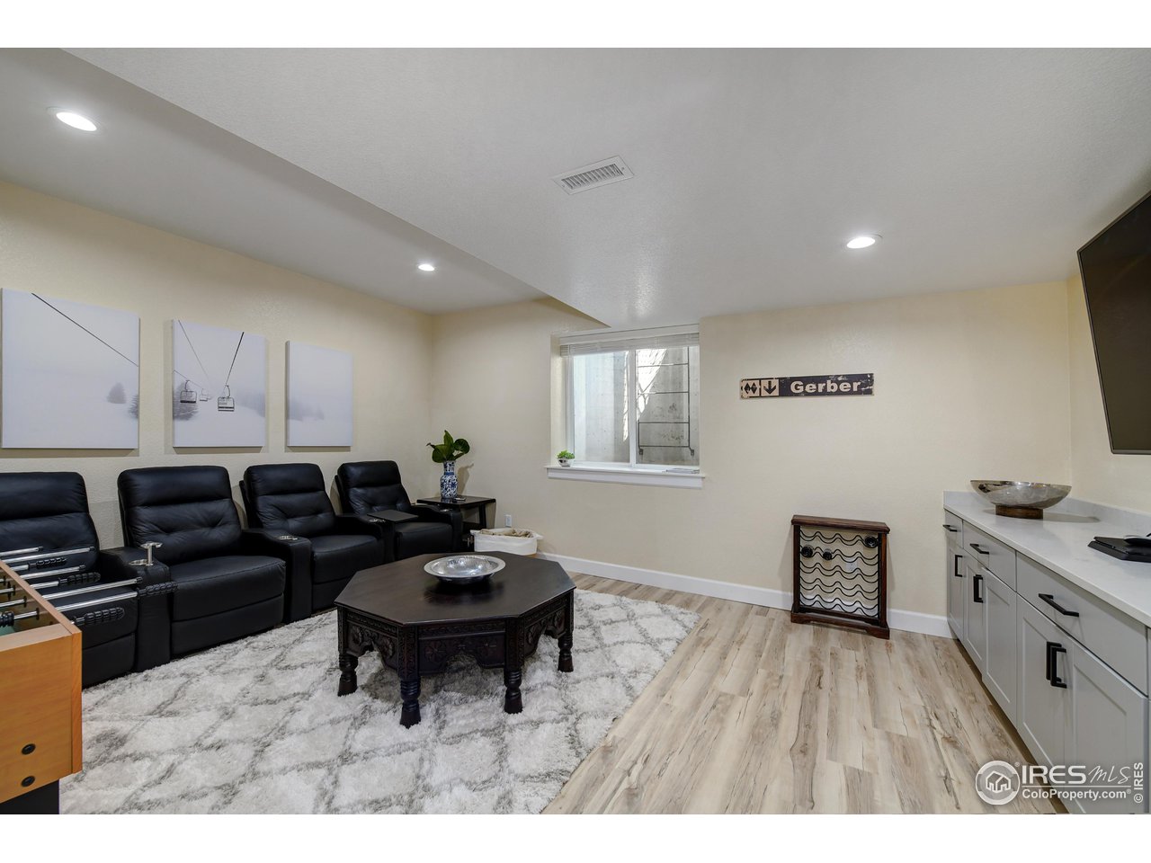 755 Terrace Circle South Boulder, CO 80304 - Photo 30 of 38 a living room with furniture and a wooden floor